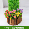 Decoración y obstrucción de las tuberías de aguas residuales, corteza simulada, plantas verdes, patrones de flores, estacas de madera y 5 pequeñas margaritas
