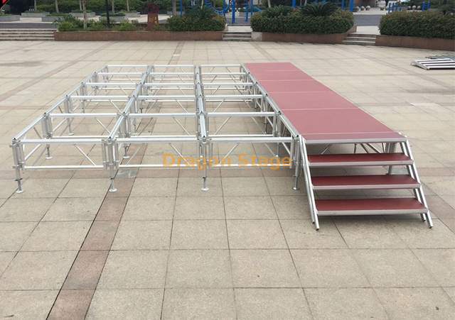 Escenario móvil portátil de aluminio con superficie antideslizante para eventos al aire libre, altura de 24,4x12,2m, 1,2-2m con barandillas de escenario